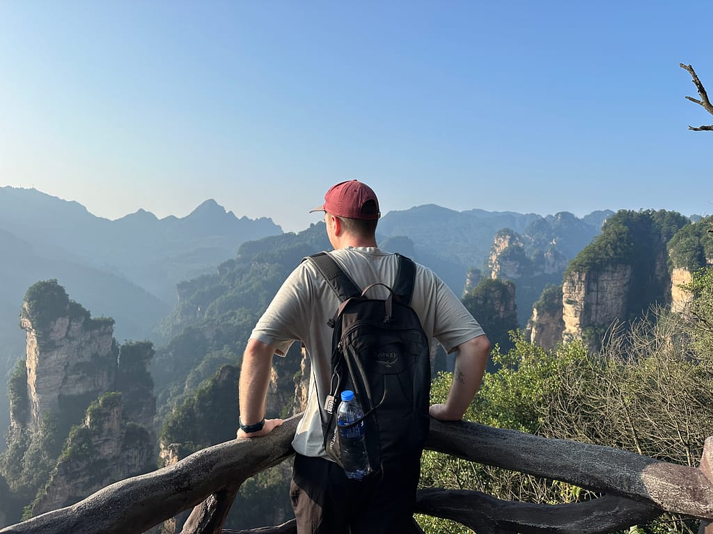 Breathtaking view of Zhangjiajie National Park in China, featuring towering sandstone pillars.