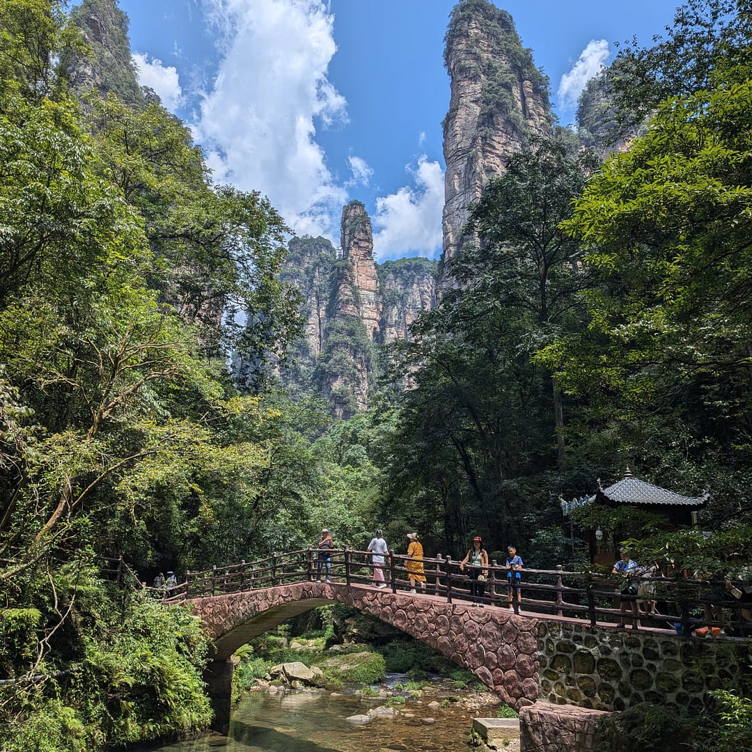 Ground-level view of Zhangjiajie’s floating mountains, showcasing the towering sandstone pillars that inspired the scenery in Avatar.