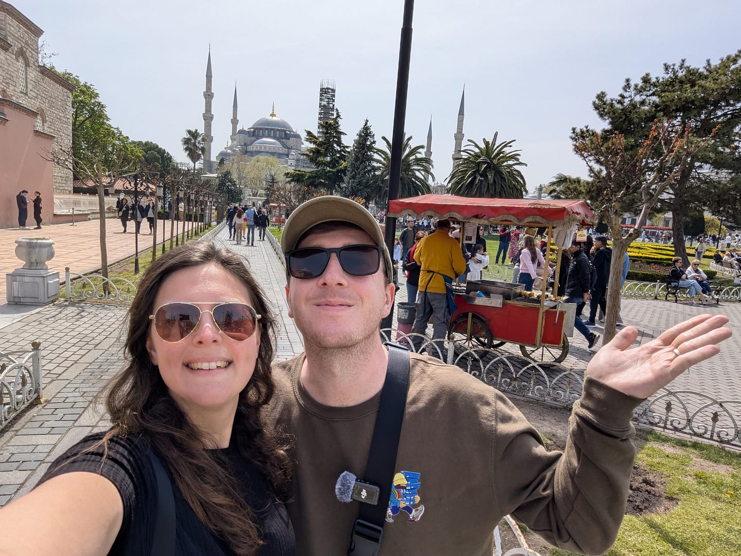 Sarah and Callum posing in front of the iconic Blue Mosque, one of the top things to do in Istanbul.