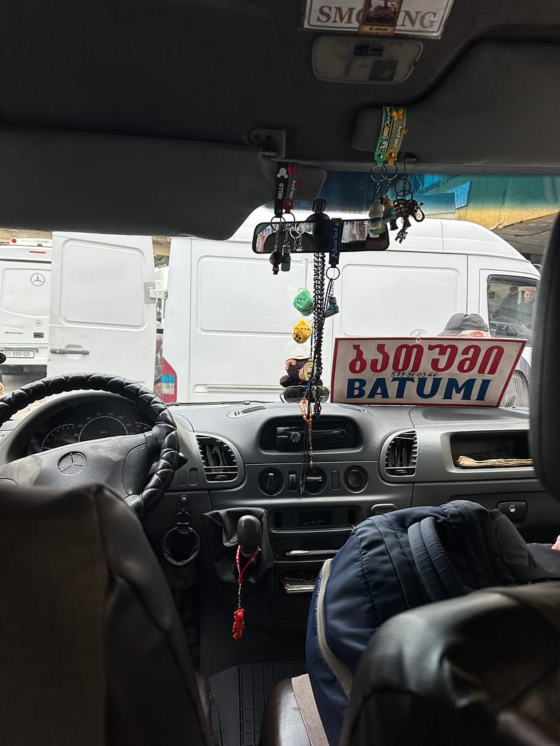 Marshrutka minibus with a Batumi sign, ready to take passengers from the Georgia border to Batumi