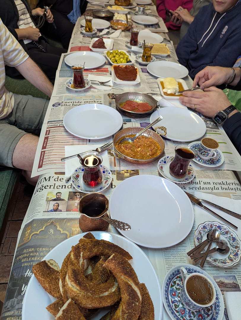 Enjoying a traditional Turkish breakfast during a guided food tour in Istanbul.
